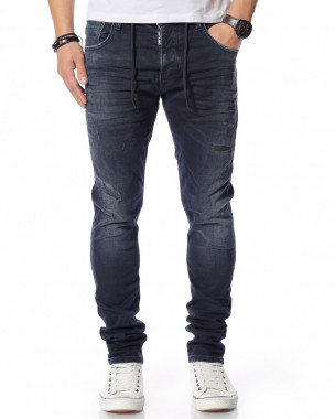 Тъмносин дънков панталон...