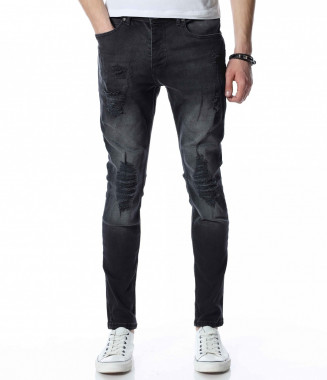 Дънки със силно надран...