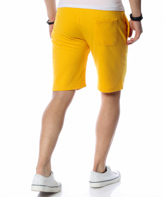 Къси панталони с връзки и нашивка...